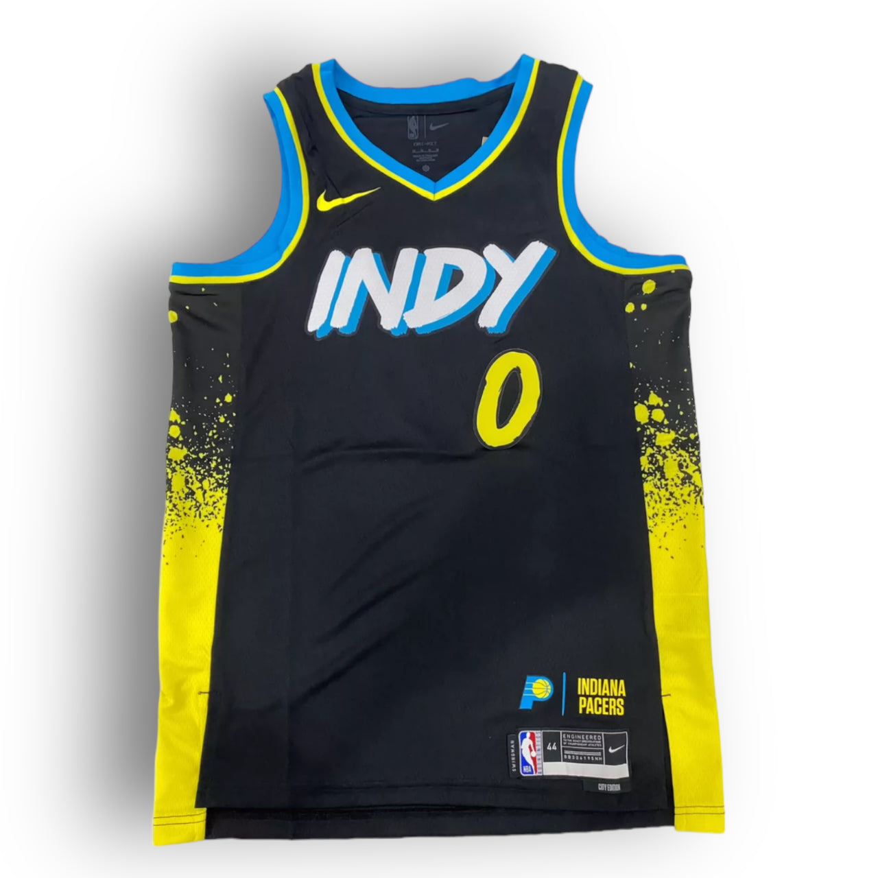 Tyrese Haliburton's Pacers City Edition Jersey embodies Indianapolis's urban energy. The grey color represents the night sky, with neon blue and yellow accents like city lights, and splattered paint patterns evoking street graffiti. The street art style font adds to the urban vibe. This jersey, made with Nike technology, not only offers comfort but also celebrates Haliburton's breakout season, averaging 24.7 points and 12.5 assists per game.